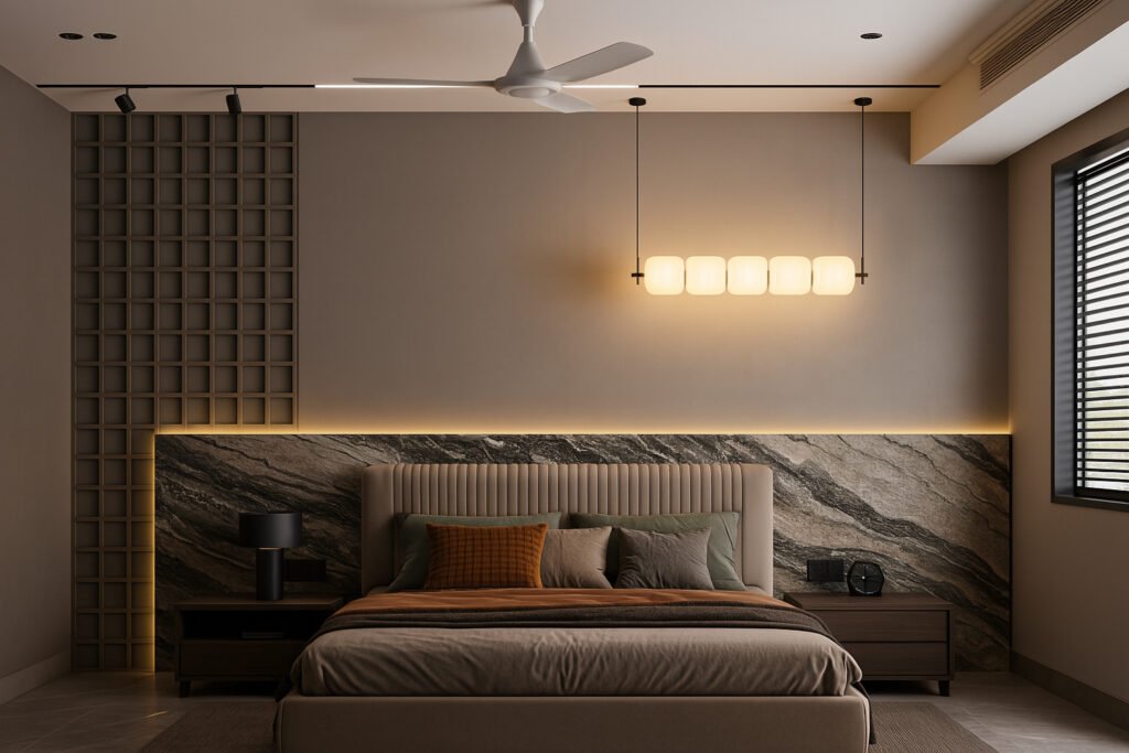 Modern bedroom with a taupe color palette, featuring a large upholstered bed with striped headboard, layered pillows, stone-textured accent wall with integrated LED lighting, minimalist dark wood nightstands, contemporary pendant light, and a sleek ceiling fan.